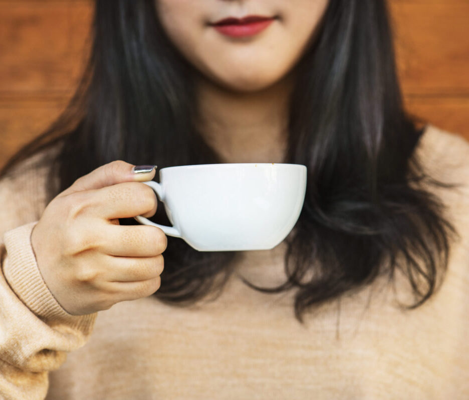 Woman Enjoying Coffee On The Weekend 2022 12 16 00 29 40 Utc Scaled E1679031513572