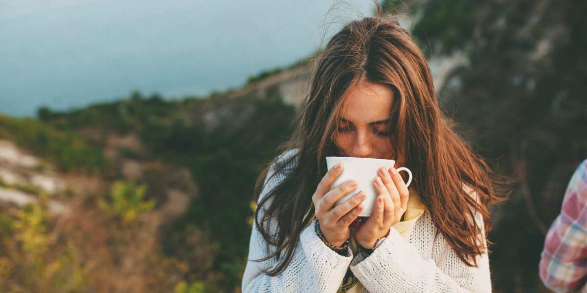 Teenage Girl Drinking Coffee.